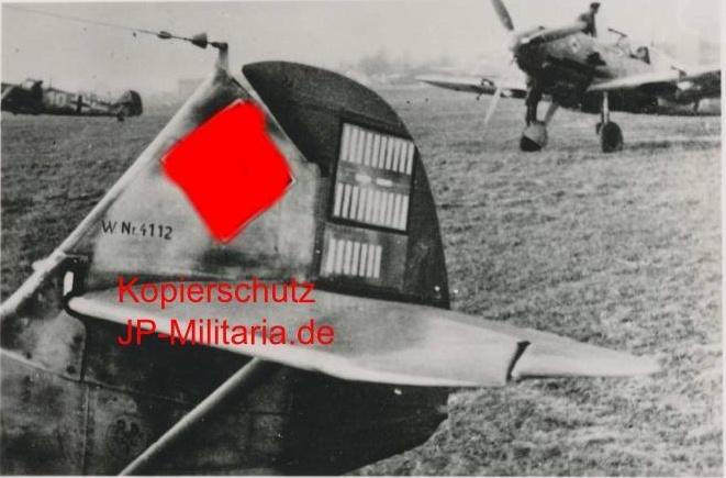Bf 109 E-7, Hptm. Heinz "Pietzsch" Bretnütz, Jagdgeschwader 53, II. Gruppe, Stab, Deutschland, Winkel Dreieck, W.Nr. 4 112, Es sind 27 Abschussbalken zu sehen. Der 27. wurde am 19.03.1941 erzielt. Eige…